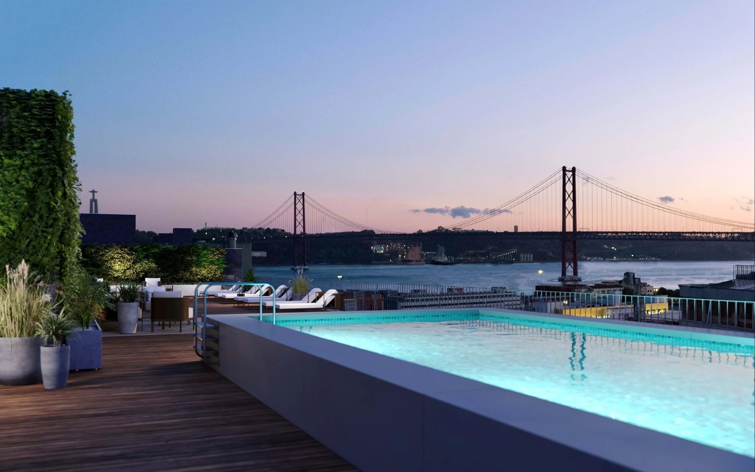 Rooftop infinity pool overlooking suspension bridge at dusk
