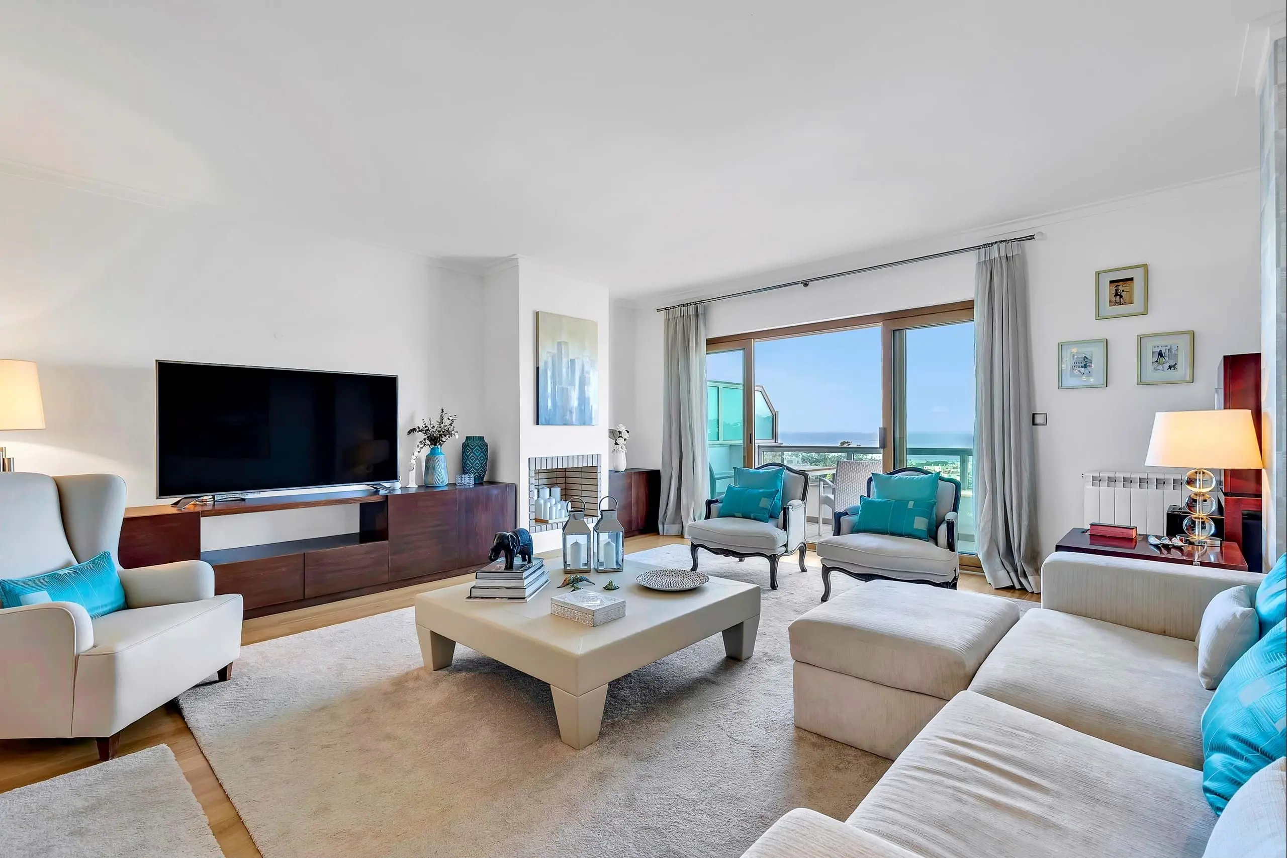 Bright modern living room with sea view balcony