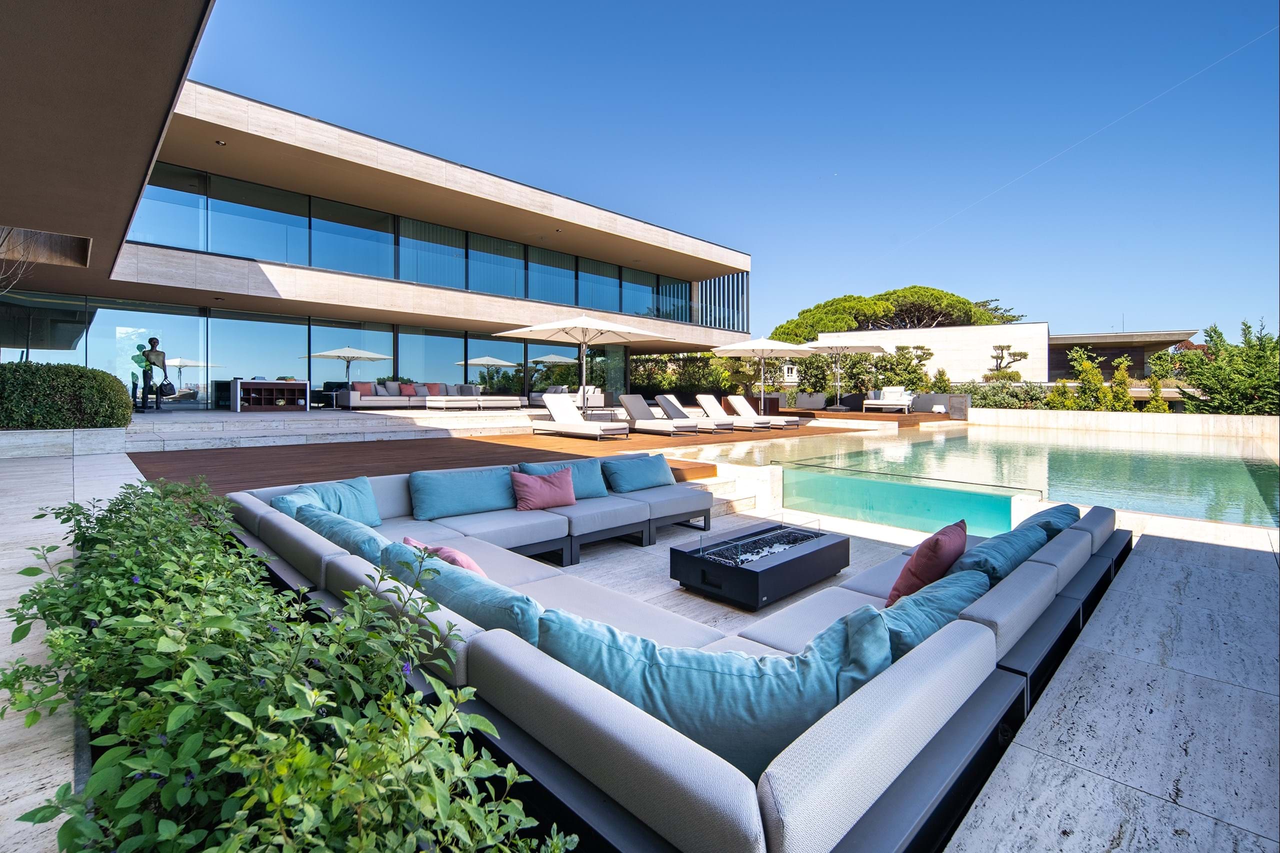 Modern luxury villa with pool and outdoor seating