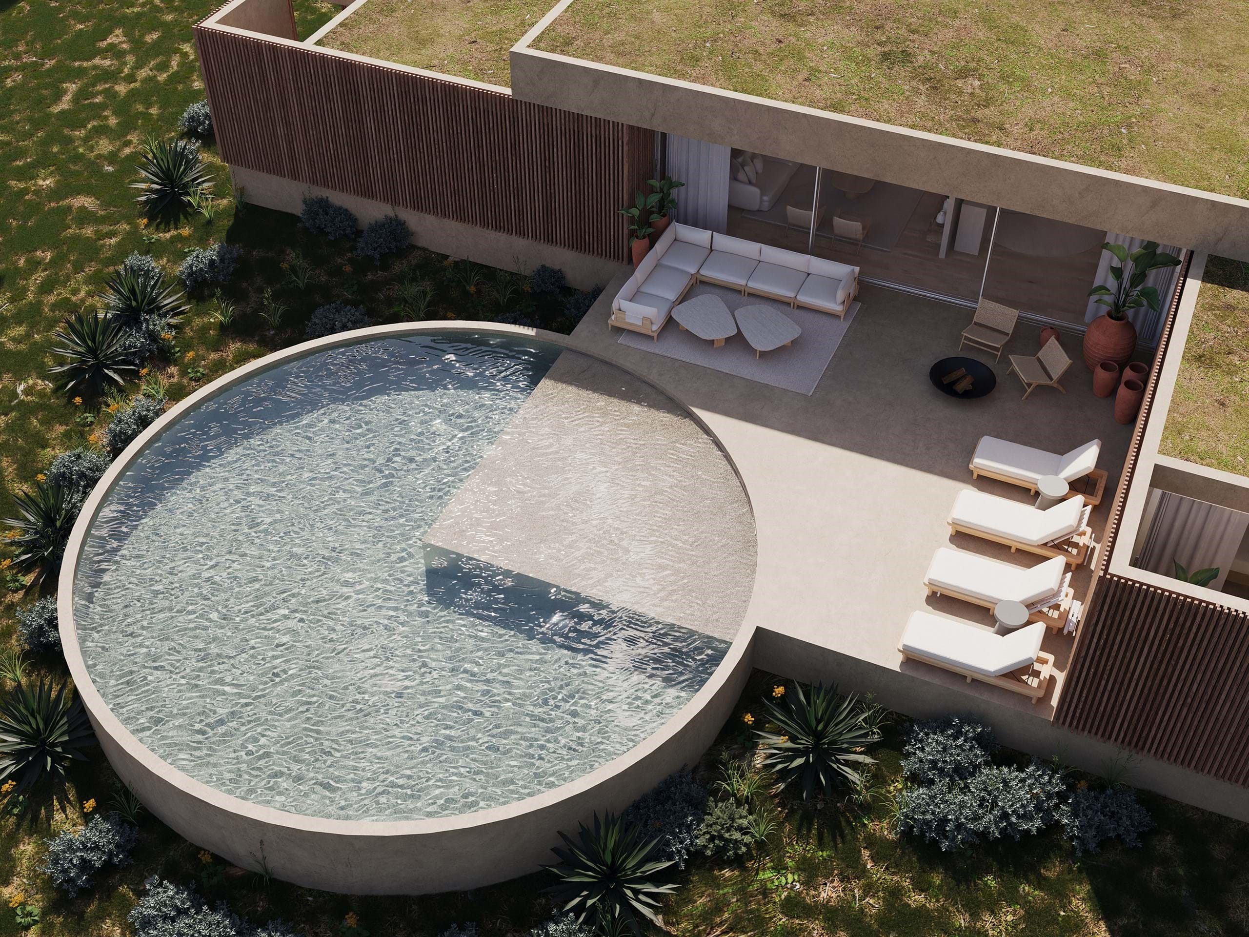 Modern home with circular swimming pool and patio