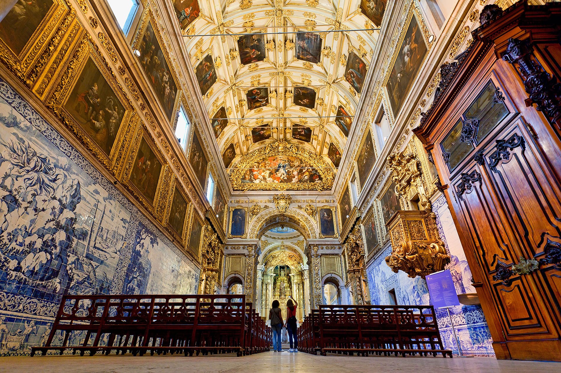 Ornate baroque church interior with gilded ceiling