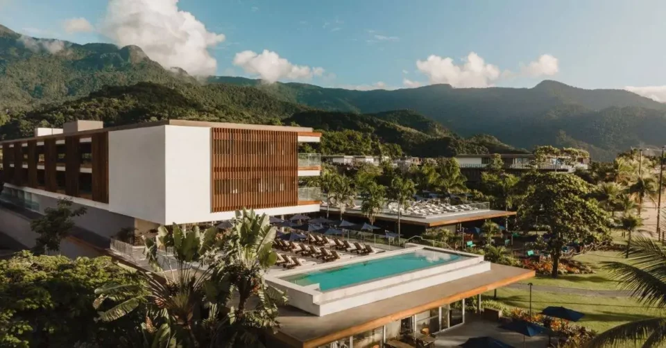 Luxury tropical resort with infinity pool and mountains